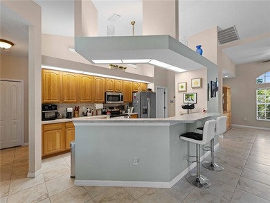 Welcome to this beautifully maintained custom home located in on Deep Creek Golf Club in Florida - for sale on GolfHomes.com, golf home, golf lot