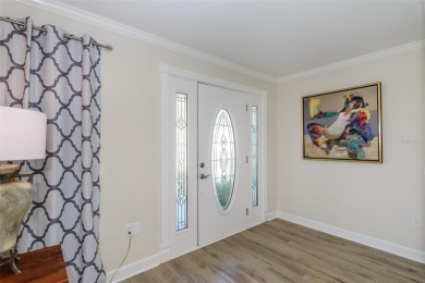 Looking for a move-in ready, completely updated 2Br/2Ba/2Gar on Lansbrook Golf Club in Florida - for sale on GolfHomes.com, golf home, golf lot