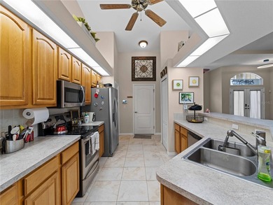 Welcome to this beautifully maintained custom home located in on Deep Creek Golf Club in Florida - for sale on GolfHomes.com, golf home, golf lot