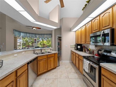 Welcome to this beautifully maintained custom home located in on Deep Creek Golf Club in Florida - for sale on GolfHomes.com, golf home, golf lot