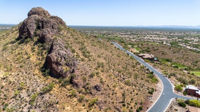 Nestled on the majestic slopes of Dinosaur Mountain, within the on Gold Canyon Golf Resort - Dinosaur Mountain in Arizona - for sale on GolfHomes.com, golf home, golf lot