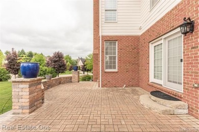 This stunning North-West facing colonial home, featuring 4 on The Inn At St. Johns Golf Course - Mark in Michigan - for sale on GolfHomes.com, golf home, golf lot