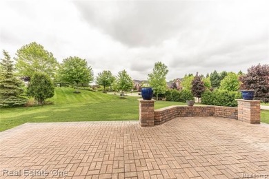 This stunning North-West facing colonial home, featuring 4 on The Inn At St. Johns Golf Course - Mark in Michigan - for sale on GolfHomes.com, golf home, golf lot