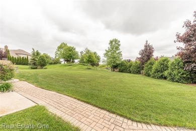 This stunning North-West facing colonial home, featuring 4 on The Inn At St. Johns Golf Course - Mark in Michigan - for sale on GolfHomes.com, golf home, golf lot