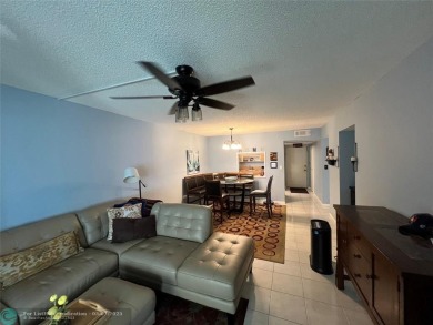 ALL AGES..E SEE IT RIGHT NOW...FIRST FLOOR END CORNER UNIT on Boca Dunes Golf and Country Club in Florida - for sale on GolfHomes.com, golf home, golf lot
