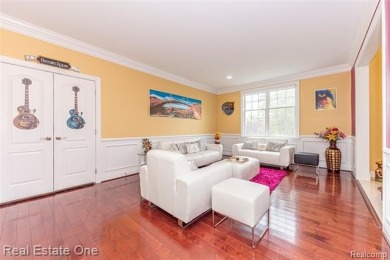 This stunning North-West facing colonial home, featuring 4 on The Inn At St. Johns Golf Course - Mark in Michigan - for sale on GolfHomes.com, golf home, golf lot
