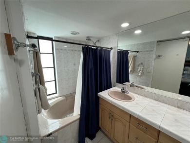 ALL AGES..E SEE IT RIGHT NOW...FIRST FLOOR END CORNER UNIT on Boca Dunes Golf and Country Club in Florida - for sale on GolfHomes.com, golf home, golf lot