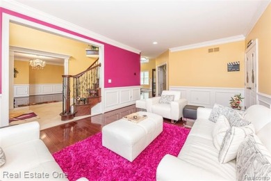 This stunning North-West facing colonial home, featuring 4 on The Inn At St. Johns Golf Course - Mark in Michigan - for sale on GolfHomes.com, golf home, golf lot