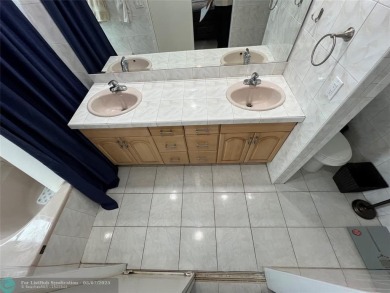 ALL AGES..E SEE IT RIGHT NOW...FIRST FLOOR END CORNER UNIT on Boca Dunes Golf and Country Club in Florida - for sale on GolfHomes.com, golf home, golf lot