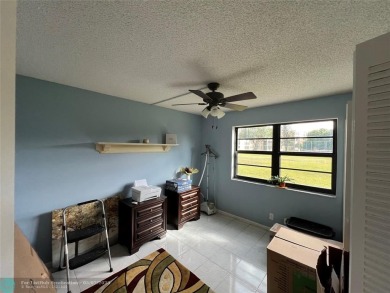 ALL AGES..E SEE IT RIGHT NOW...FIRST FLOOR END CORNER UNIT on Boca Dunes Golf and Country Club in Florida - for sale on GolfHomes.com, golf home, golf lot