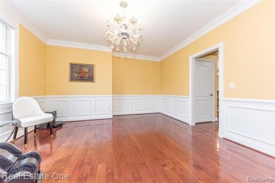 This stunning North-West facing colonial home, featuring 4 on The Inn At St. Johns Golf Course - Mark in Michigan - for sale on GolfHomes.com, golf home, golf lot
