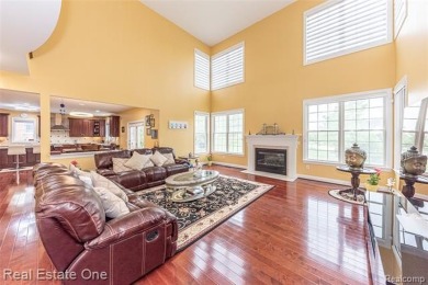 This stunning North-West facing colonial home, featuring 4 on The Inn At St. Johns Golf Course - Mark in Michigan - for sale on GolfHomes.com, golf home, golf lot