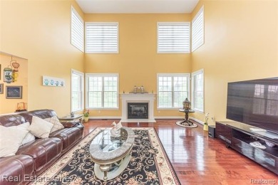 This stunning North-West facing colonial home, featuring 4 on The Inn At St. Johns Golf Course - Mark in Michigan - for sale on GolfHomes.com, golf home, golf lot