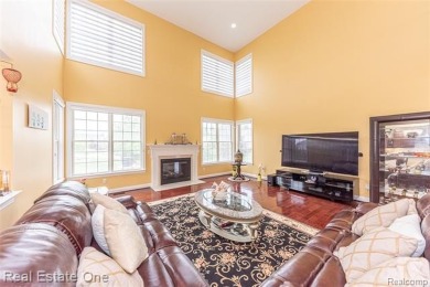 This stunning North-West facing colonial home, featuring 4 on The Inn At St. Johns Golf Course - Mark in Michigan - for sale on GolfHomes.com, golf home, golf lot