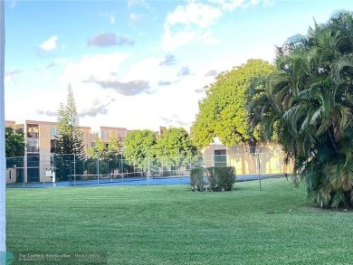 ALL AGES..E SEE IT RIGHT NOW...FIRST FLOOR END CORNER UNIT on Boca Dunes Golf and Country Club in Florida - for sale on GolfHomes.com, golf home, golf lot