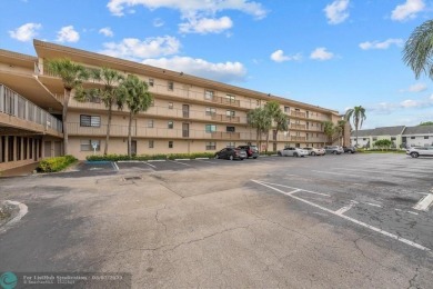 ALL AGES..E SEE IT RIGHT NOW...FIRST FLOOR END CORNER UNIT on Boca Dunes Golf and Country Club in Florida - for sale on GolfHomes.com, golf home, golf lot