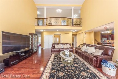 This stunning North-West facing colonial home, featuring 4 on The Inn At St. Johns Golf Course - Mark in Michigan - for sale on GolfHomes.com, golf home, golf lot