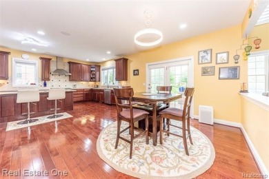 This stunning North-West facing colonial home, featuring 4 on The Inn At St. Johns Golf Course - Mark in Michigan - for sale on GolfHomes.com, golf home, golf lot
