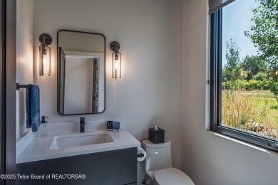 Golf course setting meets mountain modern design. Sitting on the on Jackson Hole Golf and Tennis Club in Wyoming - for sale on GolfHomes.com, golf home, golf lot