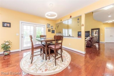 This stunning North-West facing colonial home, featuring 4 on The Inn At St. Johns Golf Course - Mark in Michigan - for sale on GolfHomes.com, golf home, golf lot
