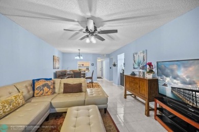 ALL AGES..E SEE IT RIGHT NOW...FIRST FLOOR END CORNER UNIT on Boca Dunes Golf and Country Club in Florida - for sale on GolfHomes.com, golf home, golf lot