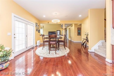 This stunning North-West facing colonial home, featuring 4 on The Inn At St. Johns Golf Course - Mark in Michigan - for sale on GolfHomes.com, golf home, golf lot