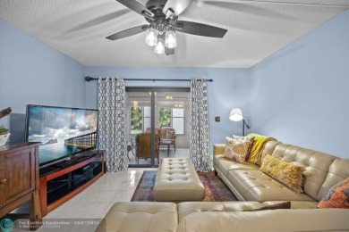 ALL AGES..E SEE IT RIGHT NOW...FIRST FLOOR END CORNER UNIT on Boca Dunes Golf and Country Club in Florida - for sale on GolfHomes.com, golf home, golf lot
