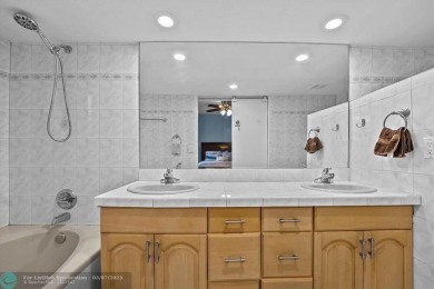 ALL AGES..E SEE IT RIGHT NOW...FIRST FLOOR END CORNER UNIT on Boca Dunes Golf and Country Club in Florida - for sale on GolfHomes.com, golf home, golf lot