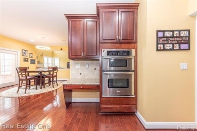 This stunning North-West facing colonial home, featuring 4 on The Inn At St. Johns Golf Course - Mark in Michigan - for sale on GolfHomes.com, golf home, golf lot