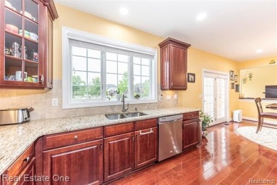 This stunning North-West facing colonial home, featuring 4 on The Inn At St. Johns Golf Course - Mark in Michigan - for sale on GolfHomes.com, golf home, golf lot