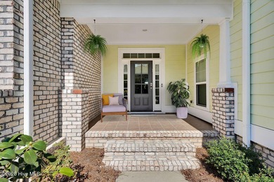 Welcome to this classic Trusst-built townhome in the sweetheart on Cape Fear National At Brunswick Forest in North Carolina - for sale on GolfHomes.com, golf home, golf lot