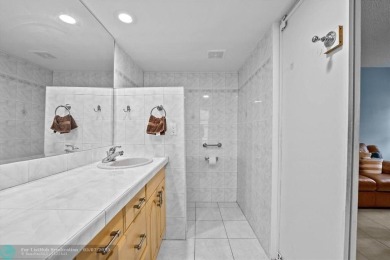 ALL AGES..E SEE IT RIGHT NOW...FIRST FLOOR END CORNER UNIT on Boca Dunes Golf and Country Club in Florida - for sale on GolfHomes.com, golf home, golf lot