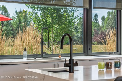 Golf course setting meets mountain modern design. Sitting on the on Jackson Hole Golf and Tennis Club in Wyoming - for sale on GolfHomes.com, golf home, golf lot
