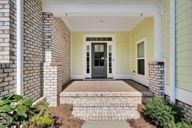 Welcome to this classic Trusst-built townhome in the sweetheart on Cape Fear National At Brunswick Forest in North Carolina - for sale on GolfHomes.com, golf home, golf lot