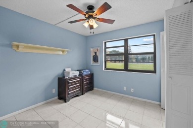 ALL AGES..E SEE IT RIGHT NOW...FIRST FLOOR END CORNER UNIT on Boca Dunes Golf and Country Club in Florida - for sale on GolfHomes.com, golf home, golf lot