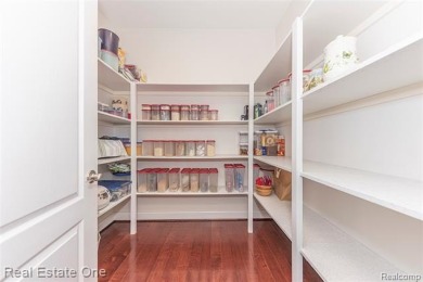 This stunning North-West facing colonial home, featuring 4 on The Inn At St. Johns Golf Course - Mark in Michigan - for sale on GolfHomes.com, golf home, golf lot