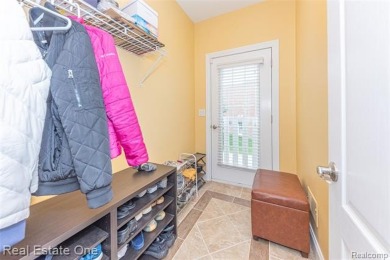 This stunning North-West facing colonial home, featuring 4 on The Inn At St. Johns Golf Course - Mark in Michigan - for sale on GolfHomes.com, golf home, golf lot