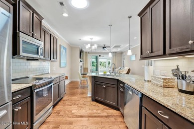 Welcome to this classic Trusst-built townhome in the sweetheart on Cape Fear National At Brunswick Forest in North Carolina - for sale on GolfHomes.com, golf home, golf lot