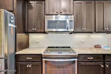 Welcome to this classic Trusst-built townhome in the sweetheart on Cape Fear National At Brunswick Forest in North Carolina - for sale on GolfHomes.com, golf home, golf lot