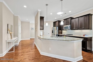 Welcome to this classic Trusst-built townhome in the sweetheart on Cape Fear National At Brunswick Forest in North Carolina - for sale on GolfHomes.com, golf home, golf lot