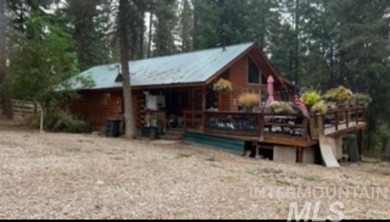 Motivated Seller! Log cabin with many improvements through the on Terrace Lakes Golf Resort in Idaho - for sale on GolfHomes.com, golf home, golf lot