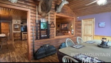 Motivated Seller! Log cabin with many improvements through the on Terrace Lakes Golf Resort in Idaho - for sale on GolfHomes.com, golf home, golf lot