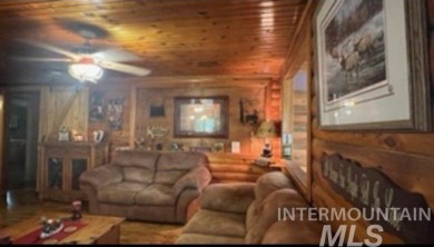 Motivated Seller! Log cabin with many improvements through the on Terrace Lakes Golf Resort in Idaho - for sale on GolfHomes.com, golf home, golf lot