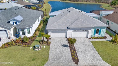 Experience the ultimate waterfront lifestyle in this on LPGA International Golf Course in Florida - for sale on GolfHomes.com, golf home, golf lot