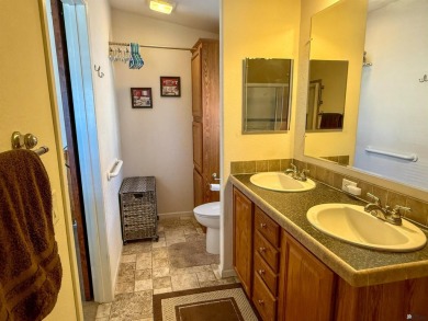 Welcome home to your charming desert retreat! This delightful on Las Barrancas Golf Course in Arizona - for sale on GolfHomes.com, golf home, golf lot