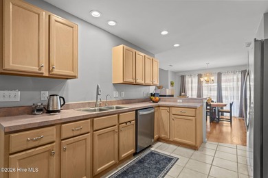 This attractive three-bedroom, two-bath brick ranch offers a on Masonboro Country Club in North Carolina - for sale on GolfHomes.com, golf home, golf lot