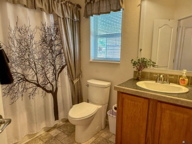 Welcome home to your charming desert retreat! This delightful on Las Barrancas Golf Course in Arizona - for sale on GolfHomes.com, golf home, golf lot