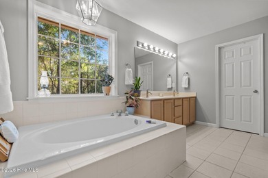 This attractive three-bedroom, two-bath brick ranch offers a on Masonboro Country Club in North Carolina - for sale on GolfHomes.com, golf home, golf lot