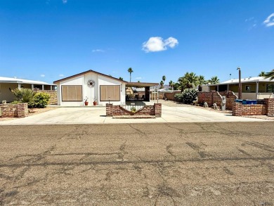 Welcome home to your charming desert retreat! This delightful on Las Barrancas Golf Course in Arizona - for sale on GolfHomes.com, golf home, golf lot