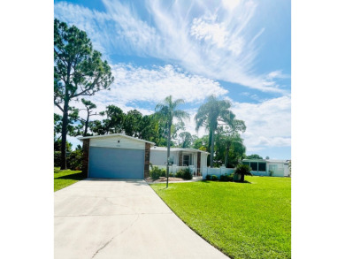 Beautiful two-bedroom, two-bath home located in the gated golf on Pine Lakes Country Club in Florida - for sale on GolfHomes.com, golf home, golf lot